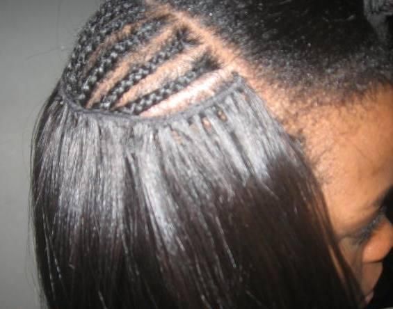 showcasing raw hair bundles being installed 