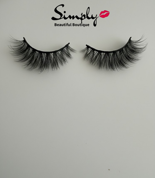 Bossy Strip Lashes. Pair of false eyelashes on a white background with 'Simply Beautiful Boutique' branding.
